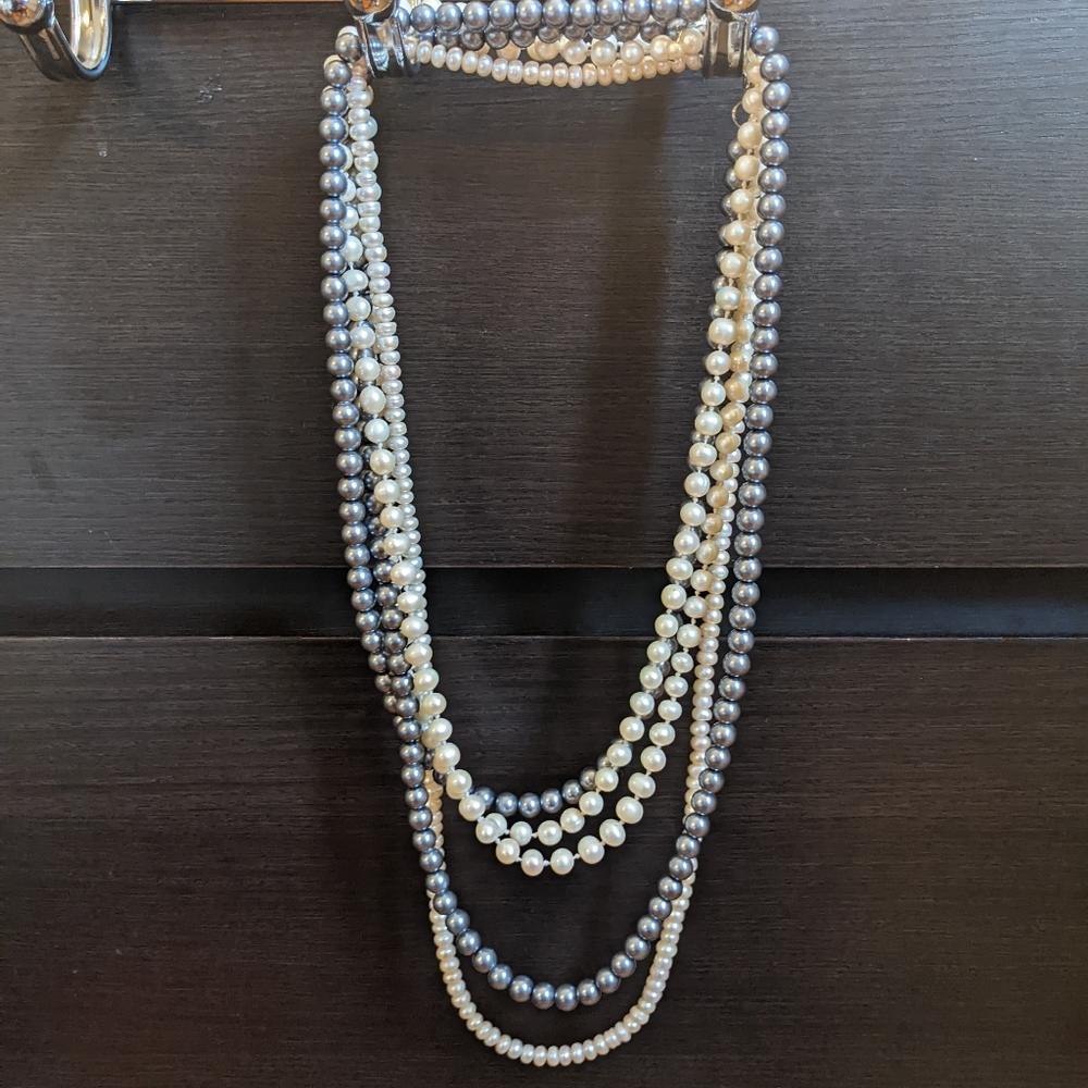 Three long pearl necklaces